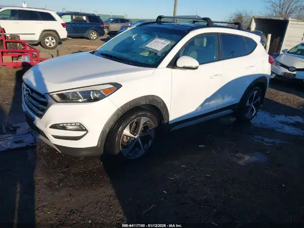 KM8J3CA27HU569991 2017 HYUNDAI TUCSON - Image 2