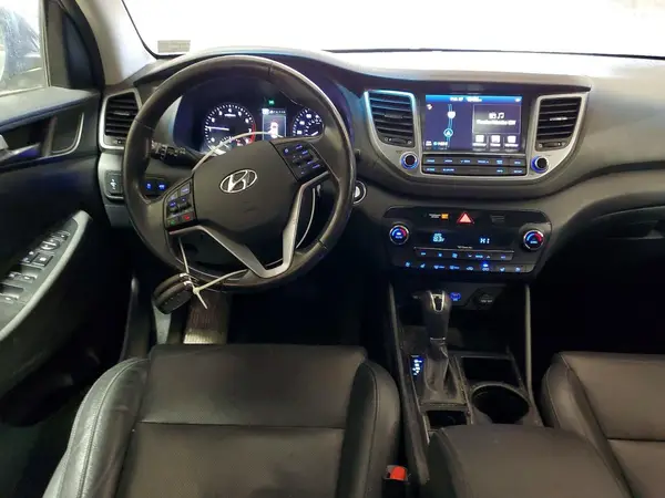 KM8J3CA28GU071619 2016 HYUNDAI TUCSON - Image 8