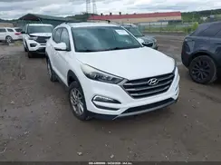 KM8J3CA28GU083706 2016 HYUNDAI TUCSON
