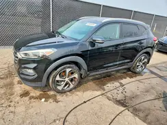 KM8J3CA28GU236262 2016 HYUNDAI TUCSON