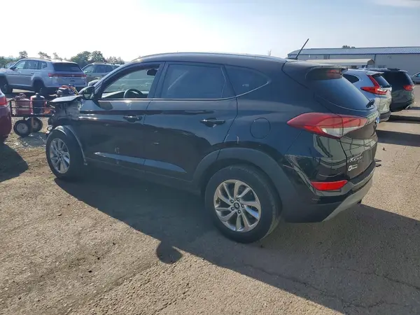 KM8J3CA28HU329509 2017 HYUNDAI TUCSON - Image 2