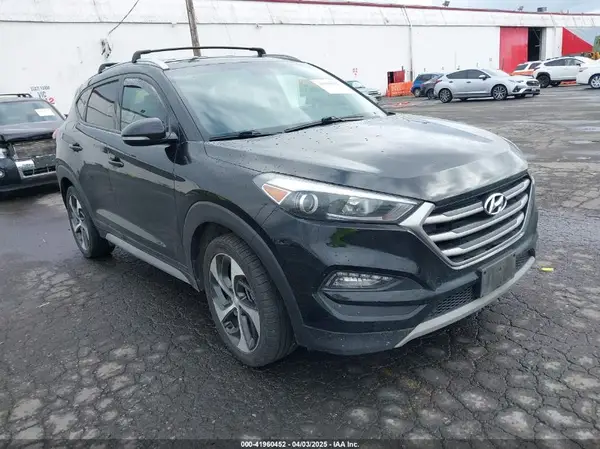KM8J3CA28HU394750 2017 HYUNDAI TUCSON - Image 1