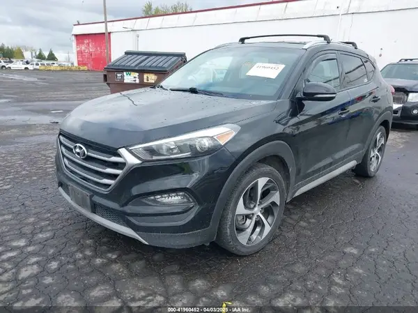KM8J3CA28HU394750 2017 HYUNDAI TUCSON - Image 2