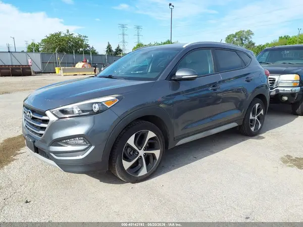 KM8J3CA28HU401437 2017 HYUNDAI TUCSON - Image 2