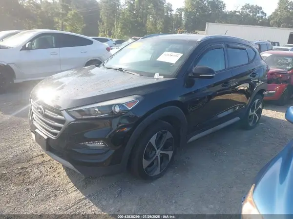 KM8J3CA28HU439086 2017 HYUNDAI TUCSON - Image 2