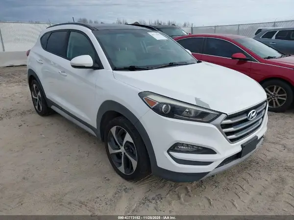 KM8J3CA28HU570695 2017 HYUNDAI TUCSON - Image 1