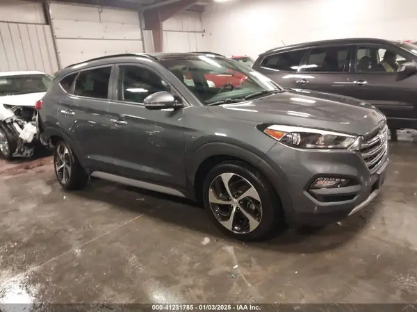 KM8J3CA28HU594656 2017 HYUNDAI TUCSON - Image 1
