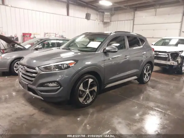 KM8J3CA28HU594656 2017 HYUNDAI TUCSON - Image 2