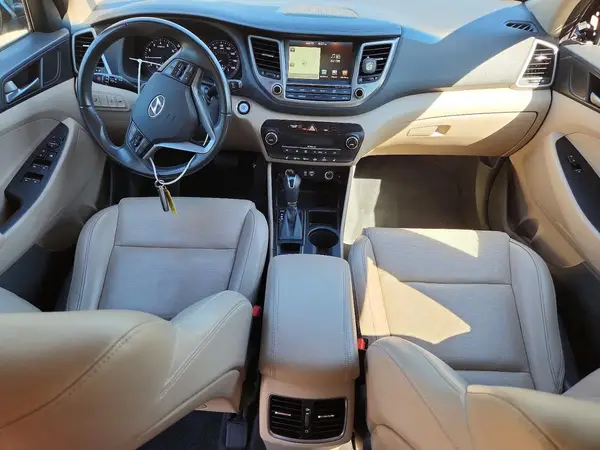 KM8J3CA29GU034661 2016 HYUNDAI TUCSON - Image 8