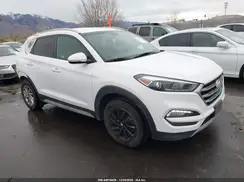 KM8J3CA29HU423883 2017 HYUNDAI TUCSON