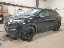 KM8J3CA29JU823738 2018 HYUNDAI TUCSON