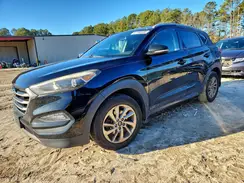 KM8J3CA2XGU038945 2016 HYUNDAI TUCSON