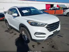 KM8J3CA2XGU047922 2016 HYUNDAI TUCSON