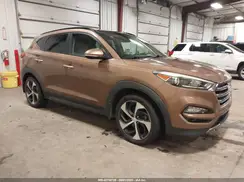 KM8J3CA2XGU049959 2016 HYUNDAI TUCSON