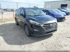 KM8J3CA2XGU063067 2016 HYUNDAI TUCSON