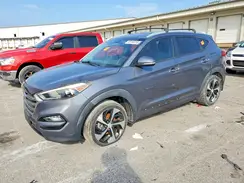 KM8J3CA2XGU074411 2016 HYUNDAI TUCSON