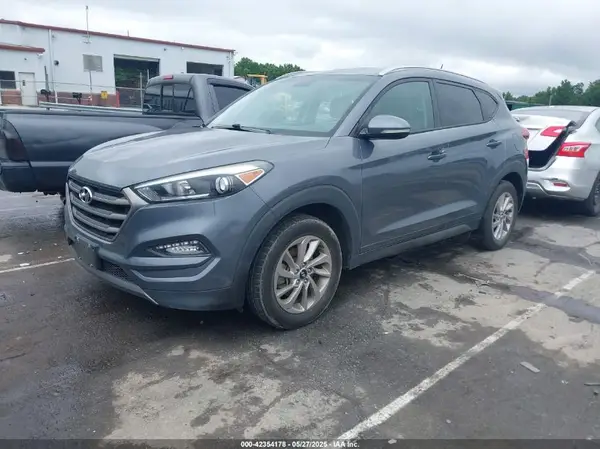 KM8J3CA2XGU083271 2016 HYUNDAI TUCSON - Image 2