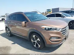 KM8J3CA2XGU087272 2016 HYUNDAI TUCSON