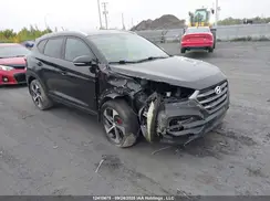 KM8J3CA2XGU096974 2016 HYUNDAI TUCSON