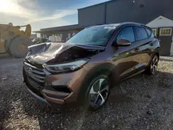 KM8J3CA2XGU105382 2016 HYUNDAI TUCSON