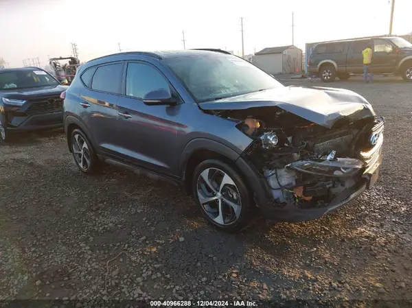 KM8J3CA2XGU109450 2016 HYUNDAI TUCSON - Image 1