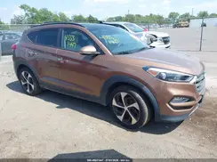 KM8J3CA2XGU110582 2016 HYUNDAI TUCSON