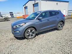 KM8J3CA2XGU113367 2016 HYUNDAI TUCSON