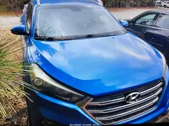 KM8J3CA2XGU119492 2016 HYUNDAI TUCSON