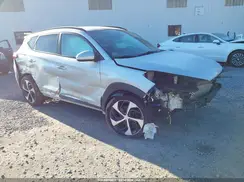 KM8J3CA2XGU121596 2016 HYUNDAI TUCSON