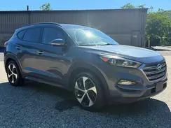 KM8J3CA2XGU137569 2016 HYUNDAI TUCSON