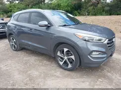 KM8J3CA2XGU141668 2016 HYUNDAI TUCSON