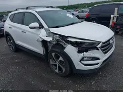 KM8J3CA2XGU161189 2016 HYUNDAI TUCSON
