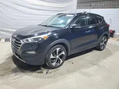 KM8J3CA2XGU166814 2016 HYUNDAI TUCSON