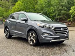 KM8J3CA2XGU194869 2016 HYUNDAI TUCSON