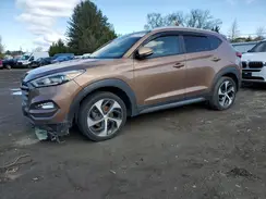 KM8J3CA2XGU198811 2016 HYUNDAI TUCSON
