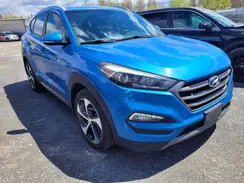 KM8J3CA2XGU213534 2016 HYUNDAI TUCSON