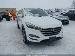 KM8J3CA2XGU216322 2016 HYUNDAI TUCSON