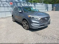 KM8J3CA2XGU248719 2016 HYUNDAI TUCSON
