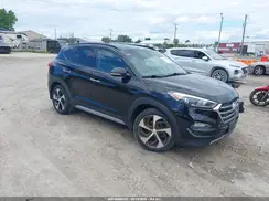 KM8J3CA2XGU257467 2016 HYUNDAI TUCSON