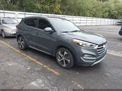 KM8J3CA2XHU336039 2017 HYUNDAI TUCSON