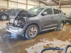 KM8J3CA2XHU419809 2017 HYUNDAI TUCSON