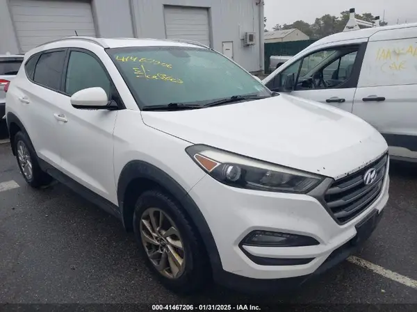 KM8J3CA40GU021699 2016 HYUNDAI TUCSON - Image 1