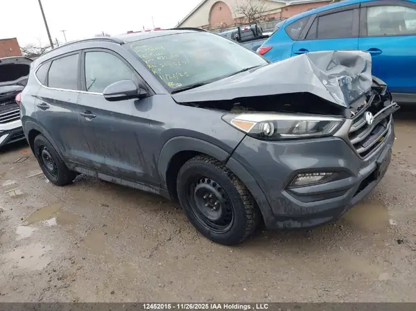KM8J3CA40GU035179 2016 HYUNDAI TUCSON - Image 1