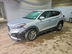 KM8J3CA40GU058641 2016 HYUNDAI TUCSON