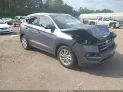 KM8J3CA40GU059658 2016 HYUNDAI TUCSON