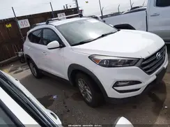 KM8J3CA40GU082759 2016 HYUNDAI TUCSON