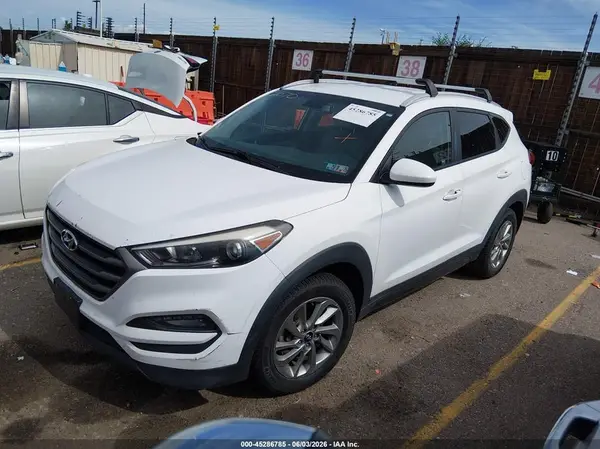 KM8J3CA40GU082759 2016 HYUNDAI TUCSON - Image 2