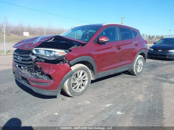 KM8J3CA40GU083040 2016 HYUNDAI TUCSON - Image 2