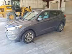 KM8J3CA40GU092594 2016 HYUNDAI TUCSON