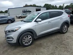 KM8J3CA40GU100631 2016 HYUNDAI TUCSON
